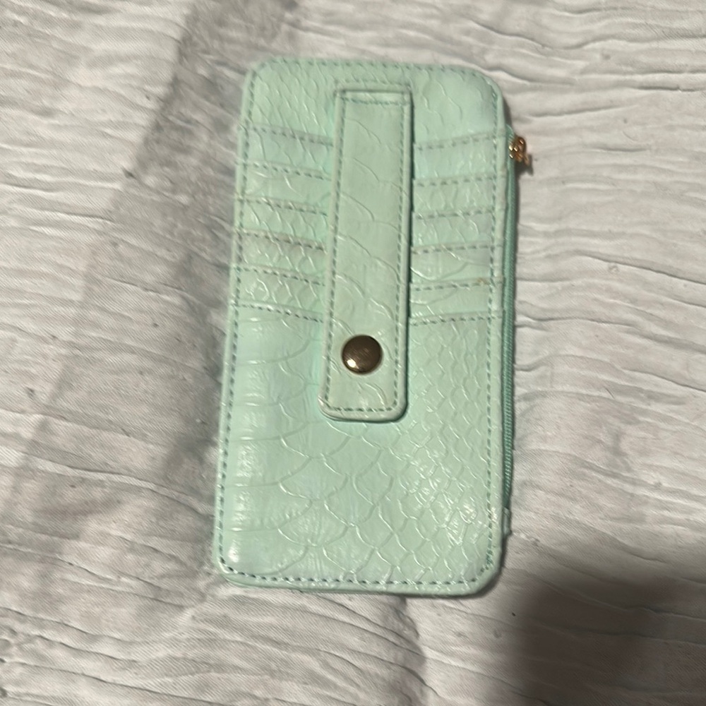 Green Leather Wallet with Snap Closure and Textured Design